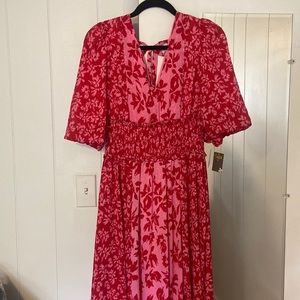 Taylor Brand Maxi Dress with balloon sleeves.